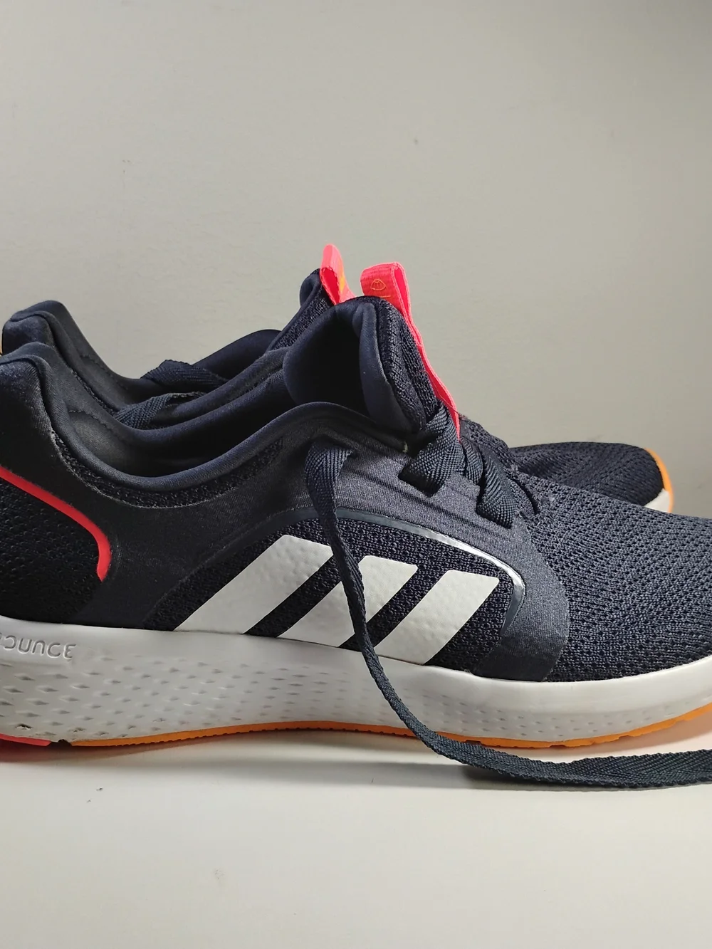 adidas Edge Lux 5 Women Navy Knit Running Sneakers with Neon Orange Accents